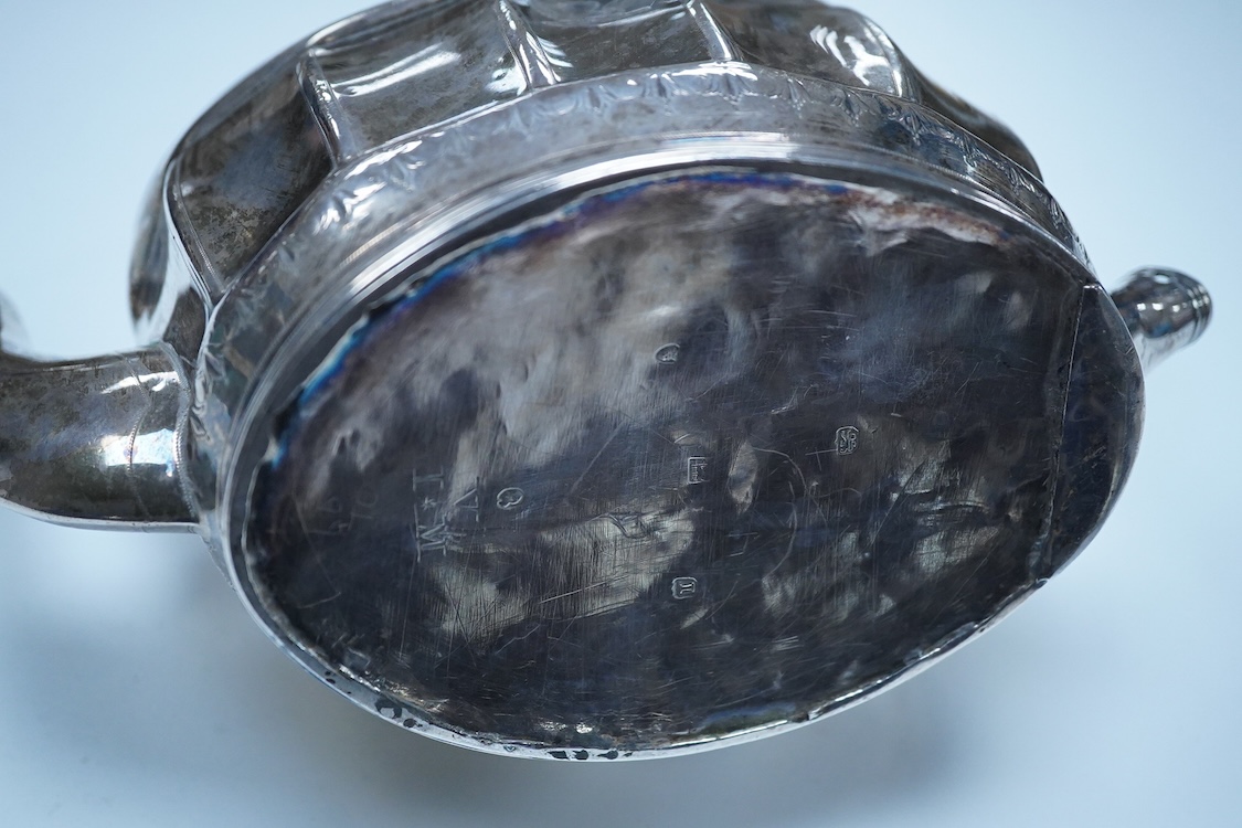 A George III silver oval teapot, by Peter, Ann & William Bateman, London 1804, (a.f.). engraved with floral bands, 14.4oz.